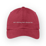 “She’s thriving, don’t distract her” adjustable back cap