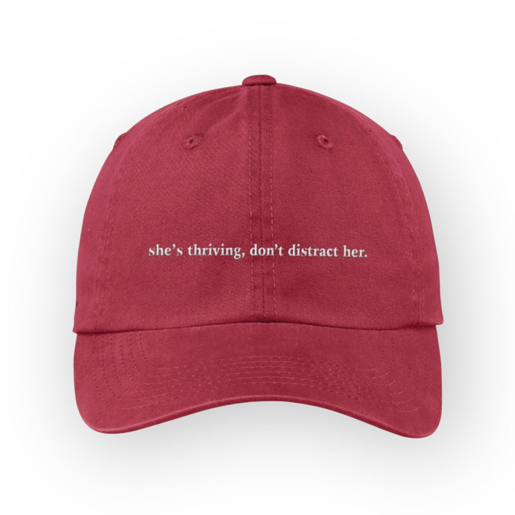 “She’s thriving, don’t distract her” adjustable back cap
