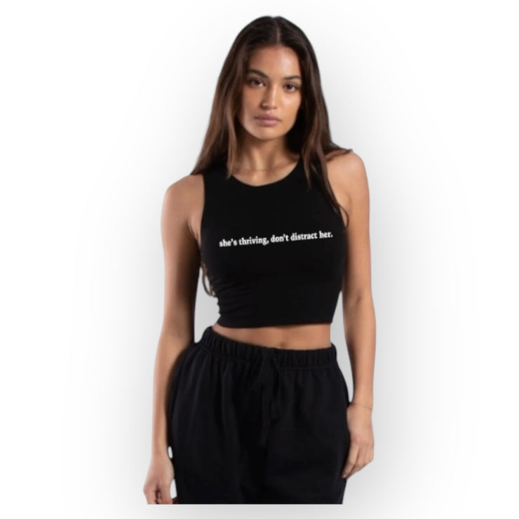 “she’s thriving don’t distract her.” Crop tank top