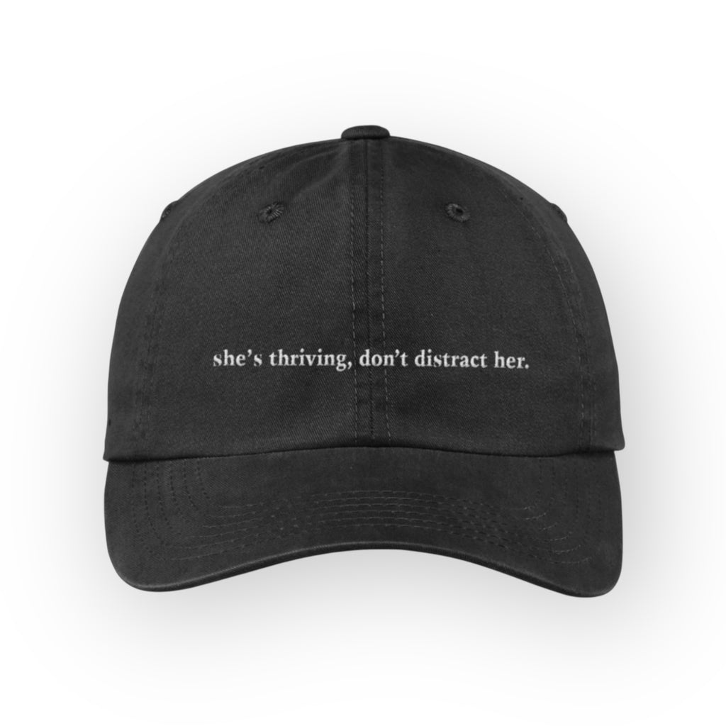 “She’s thriving, don’t distract her” adjustable back cap